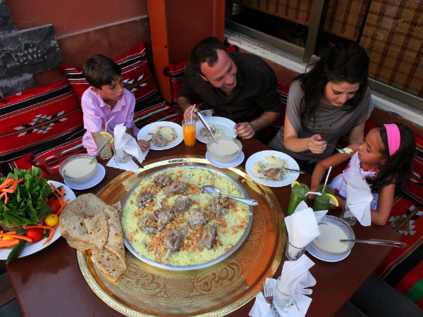 Family Eating Jordanian Traditional Food